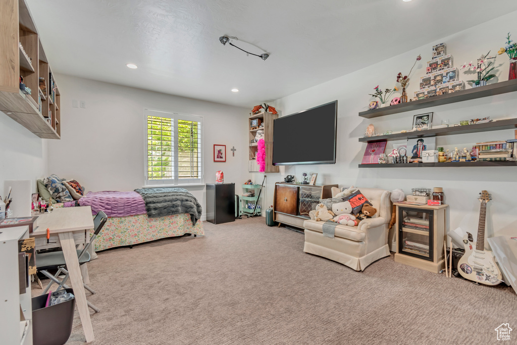 Bedroom with carpet floors and recessed lighting