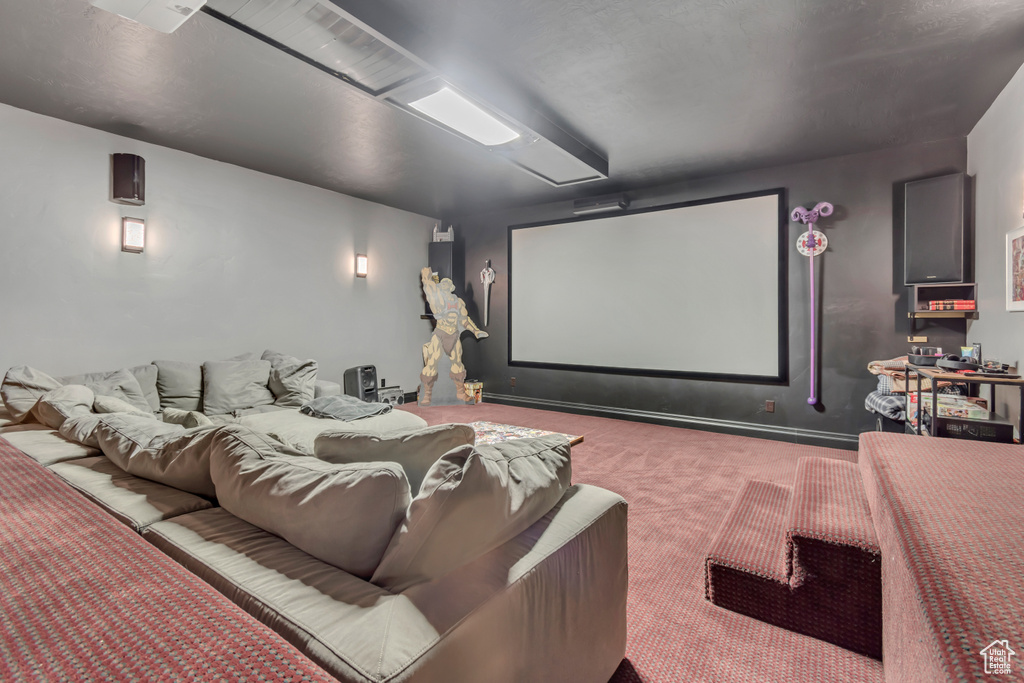 Home theater room featuring carpet flooring
