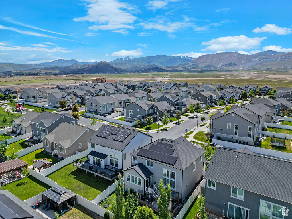 Aerial view of residential area with a mountainous background