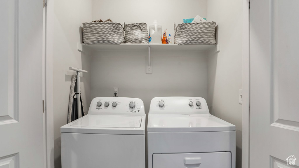 Laundry room featuring independent washer and dryer