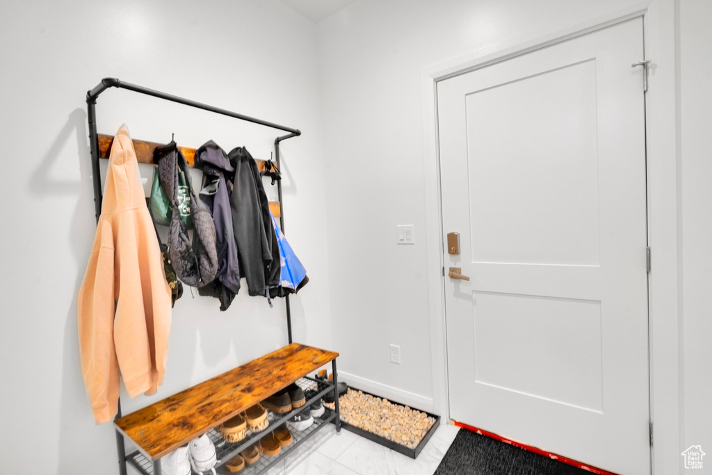 Mudroom featuring baseboards