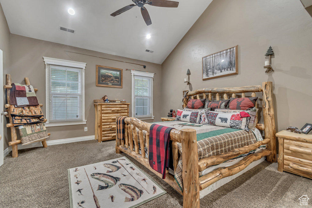 Bedroom featuring carpet, ceiling fan, high vaulted ceiling, and baseboards
