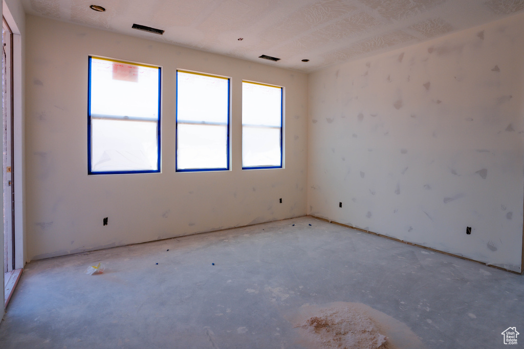 Empty room featuring healthy amount of natural light