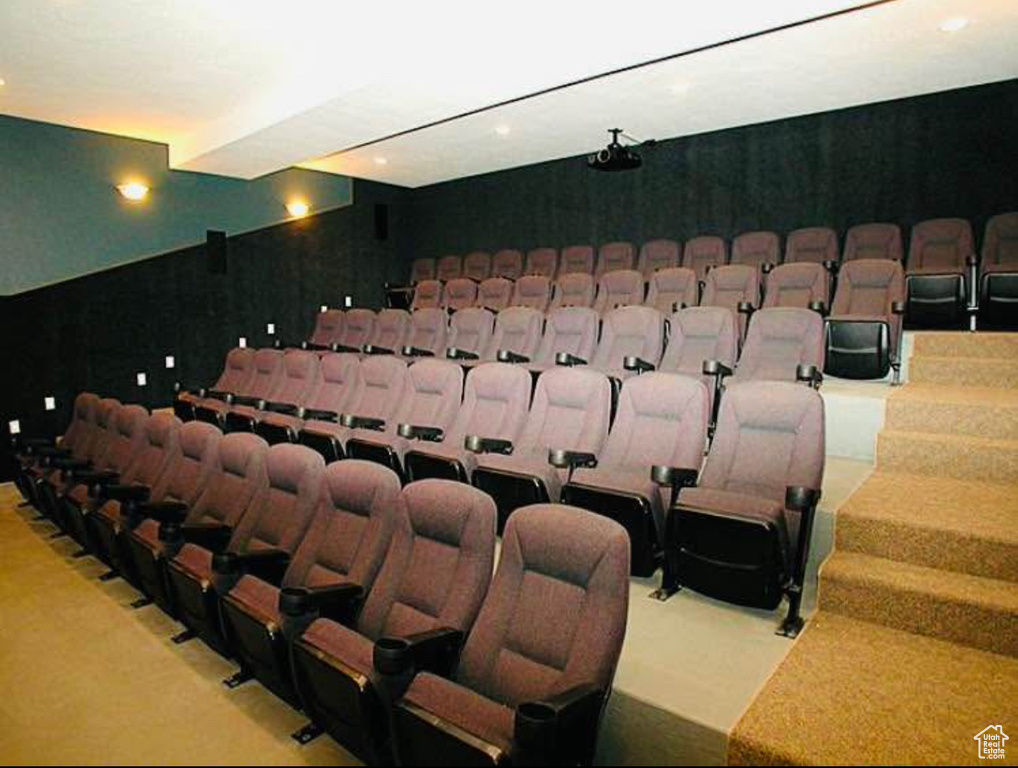 Home theater room featuring carpet and recessed lighting