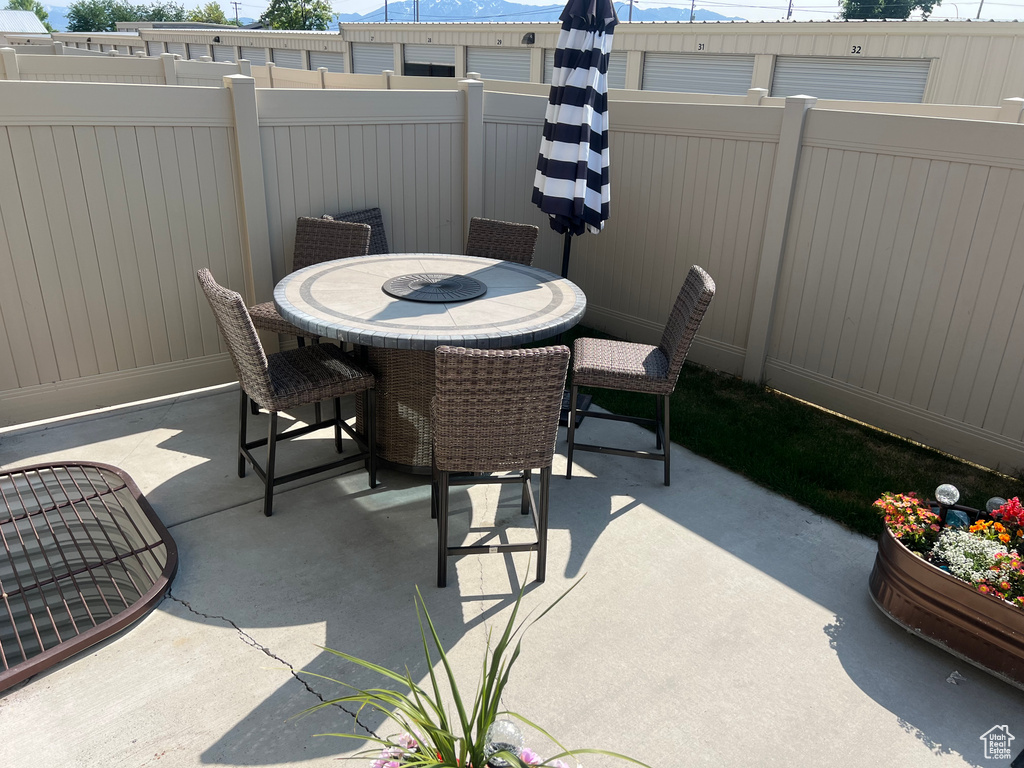 View of patio featuring outdoor dining area