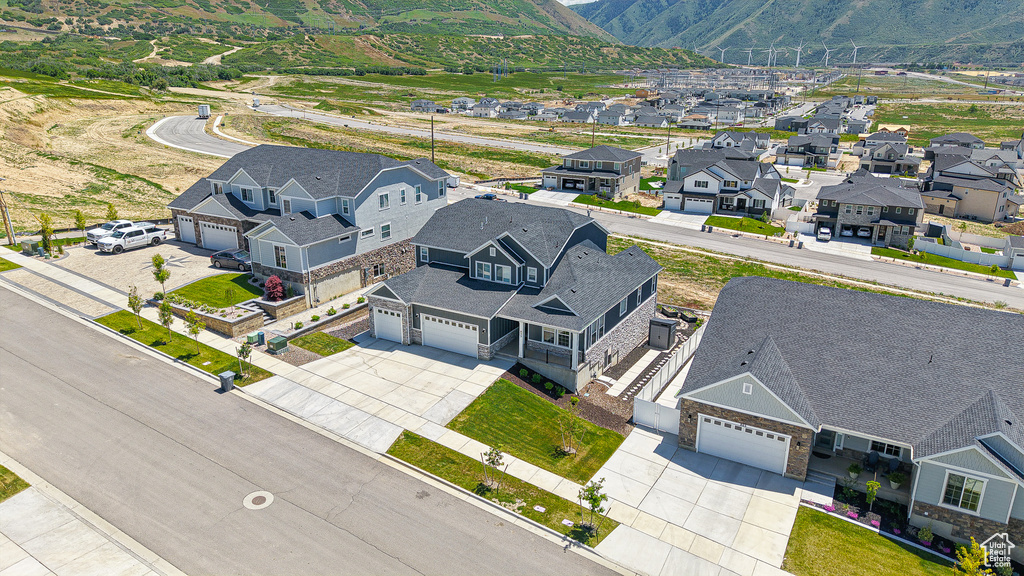 Aerial view of residential area with a mountainous background
