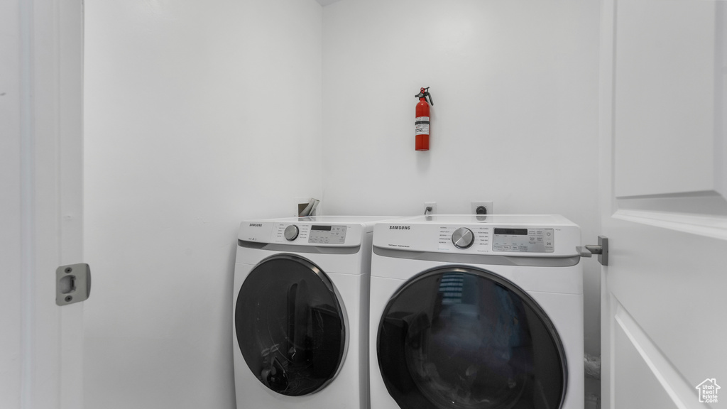 Laundry area featuring washer and clothes dryer