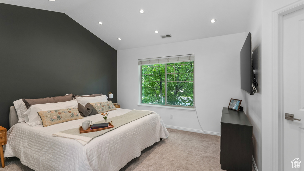 Bedroom with recessed lighting, carpet, vaulted ceiling, and baseboards