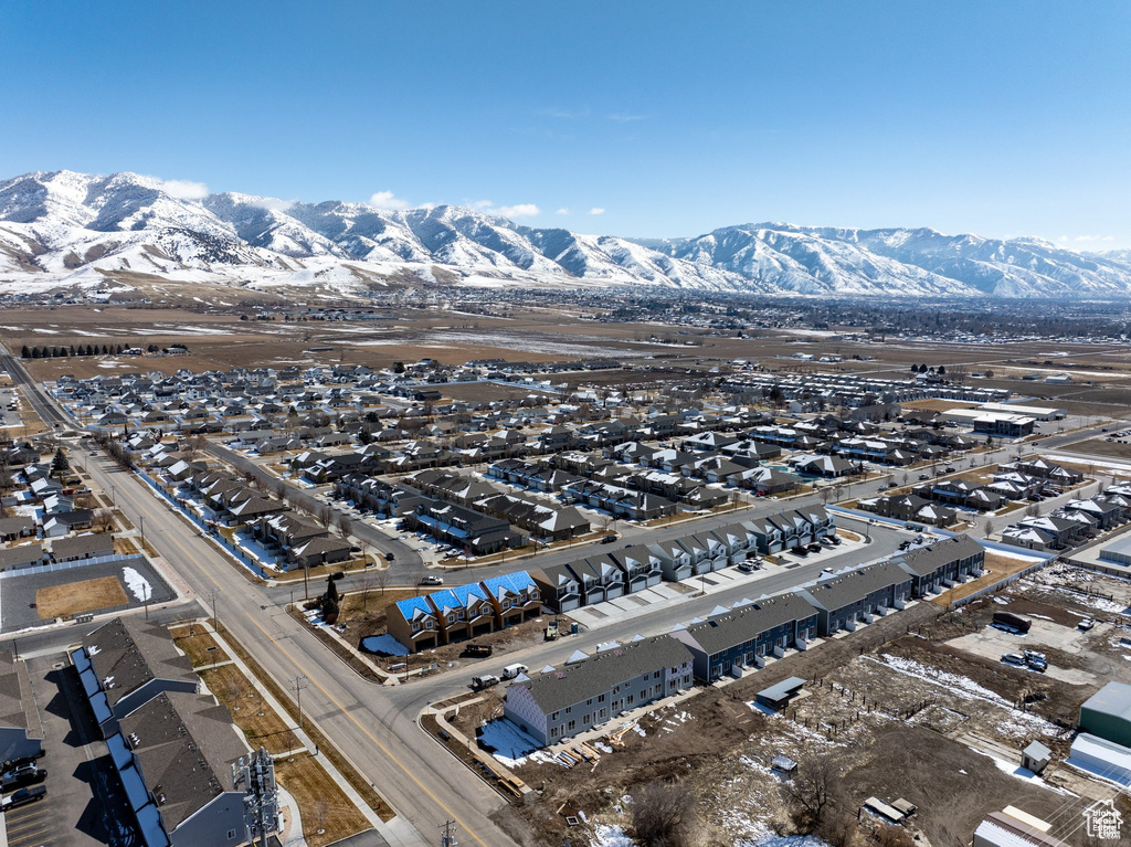 View of property location with mountains and nearby suburban area