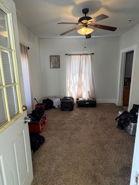 Miscellaneous room featuring carpet floors and ceiling fan