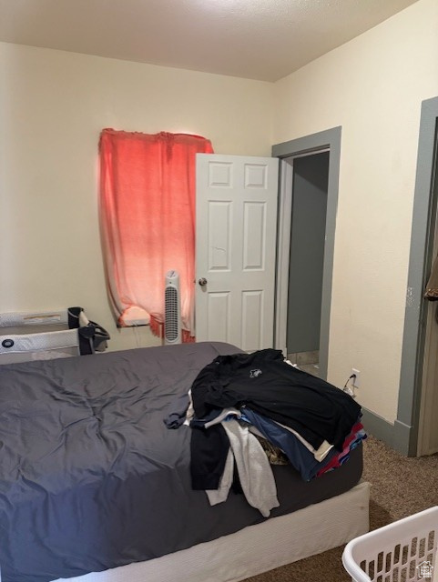Bedroom featuring carpet flooring