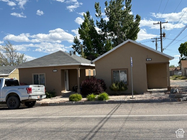 View of front of property with stucco siding