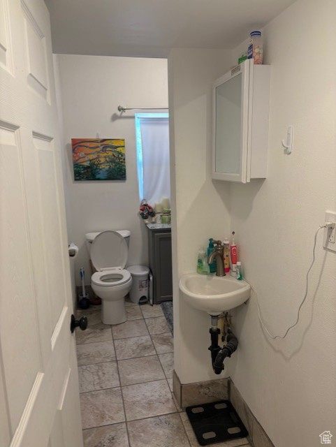 Bathroom featuring toilet and a sink