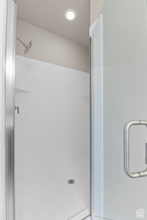 Full bath with a shower stall