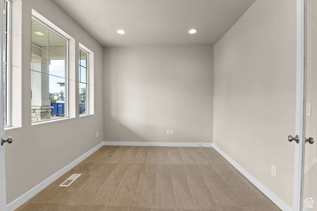 Unfurnished room with carpet, recessed lighting, and baseboards