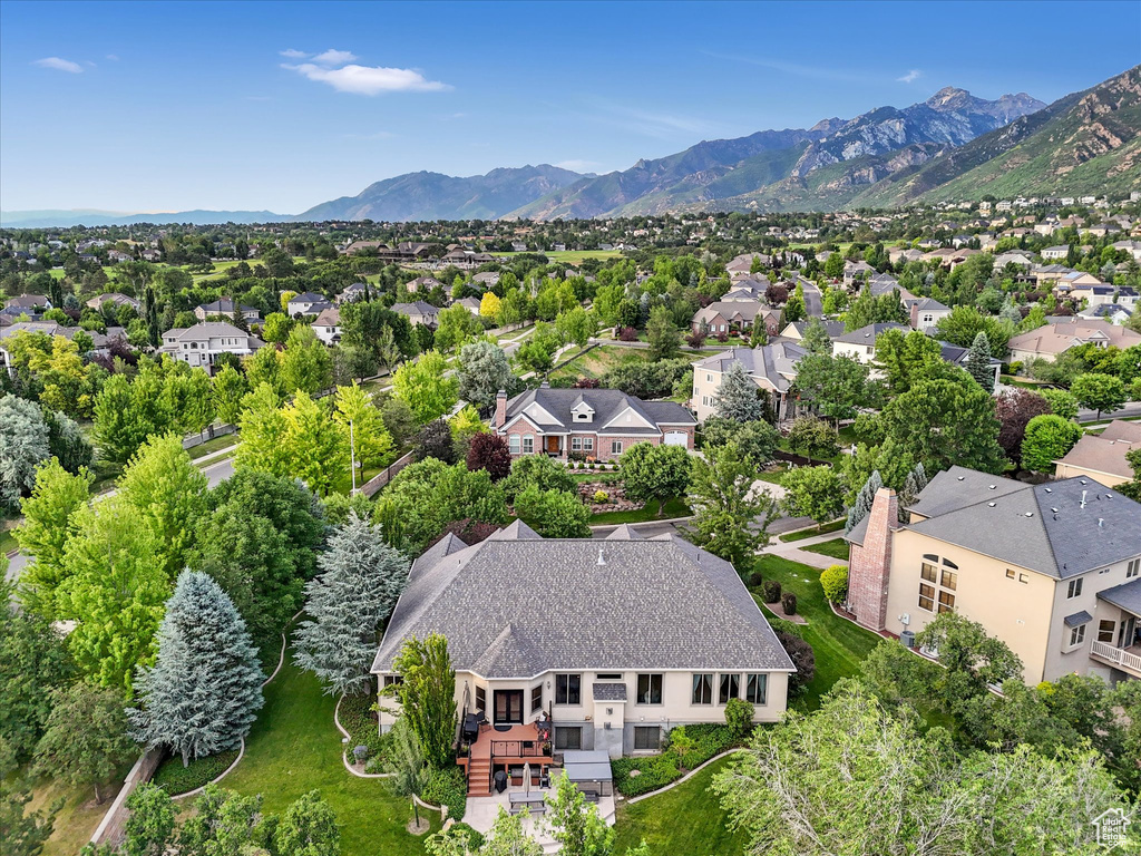Aerial view of residential area with mountains