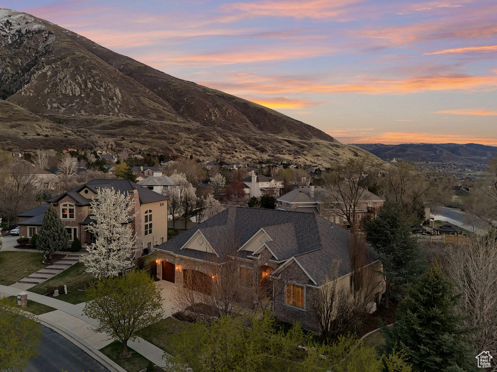View of mountain background featuring nearby suburban area