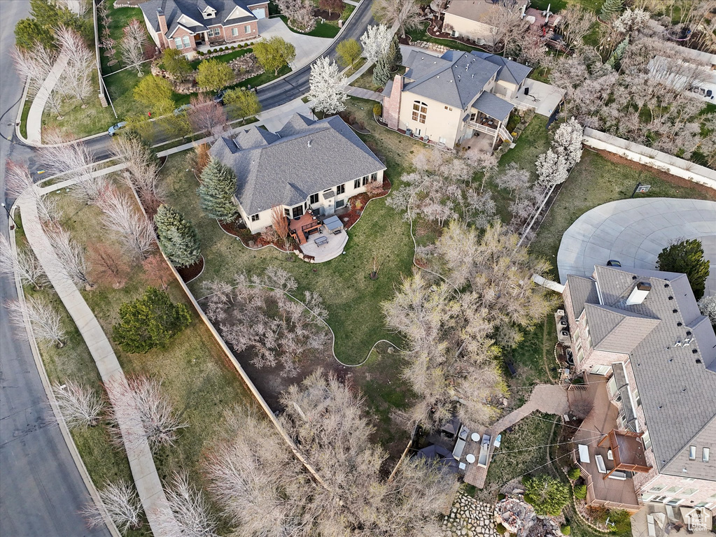 Aerial view of property's location with nearby suburban area