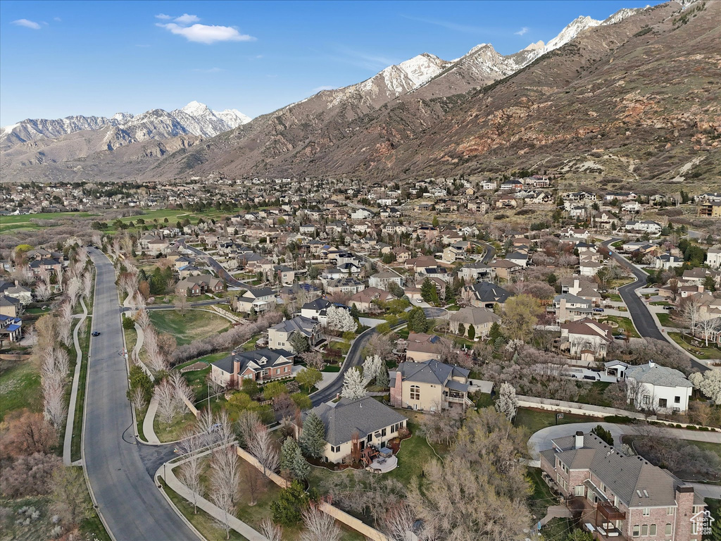 View of mountain background featuring nearby suburban area