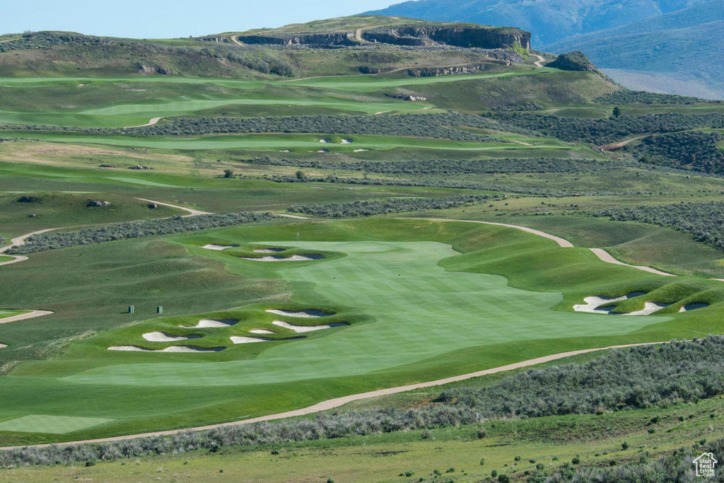 View of property's community featuring a mountain view and golf course view