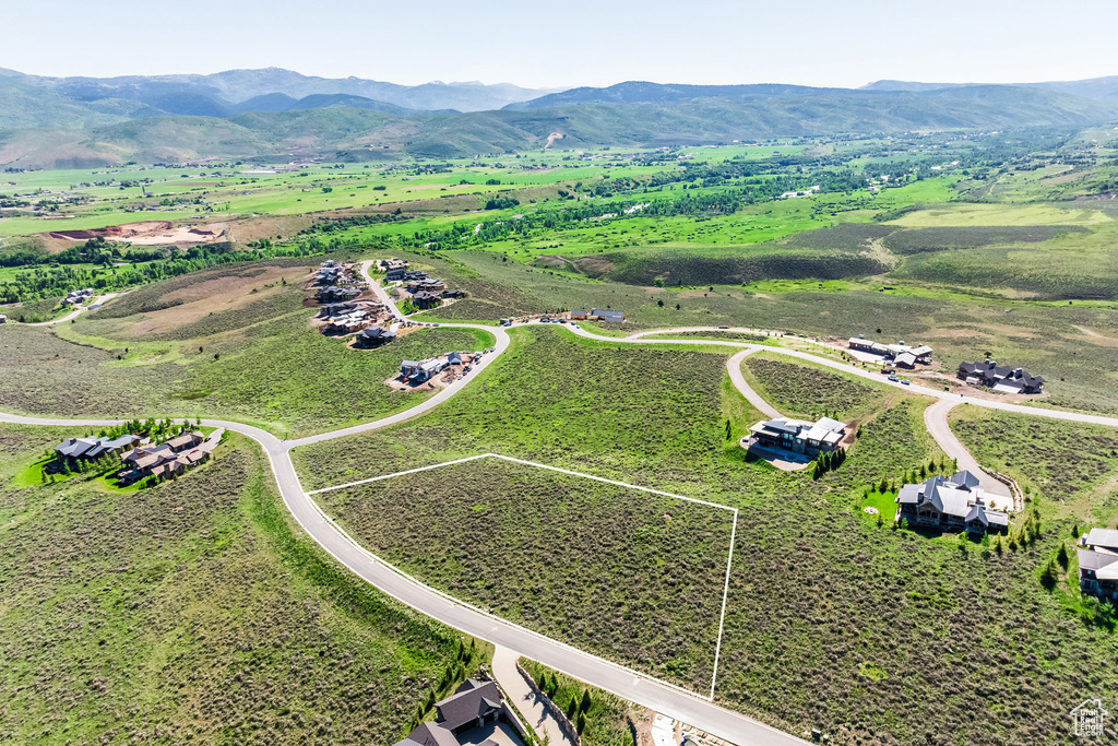 View of rural area featuring mountains and property parcel outlined