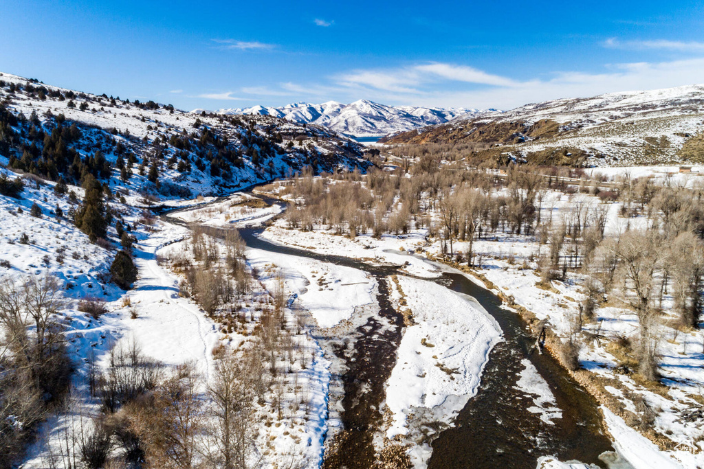 Snowy aerial view with a mountain view