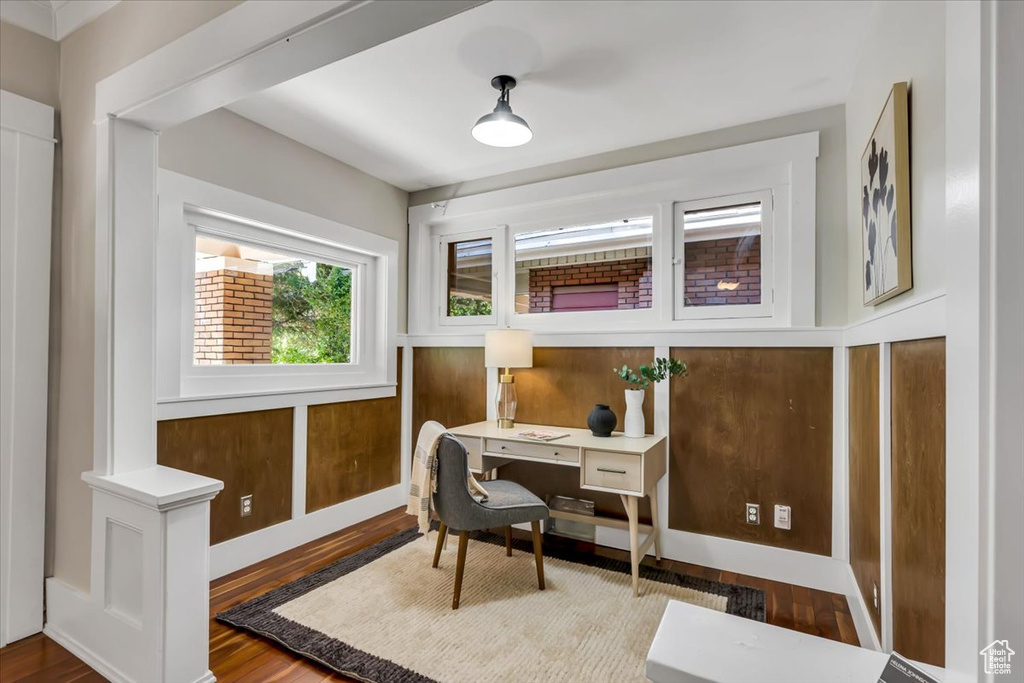 Home office featuring wood finished floors