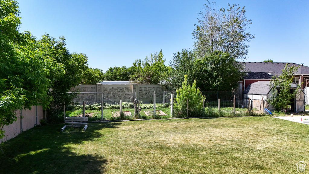 View of yard featuring a vegetable garden