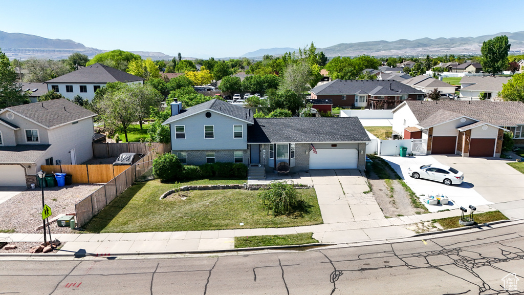 Aerial perspective of suburban area with mountains