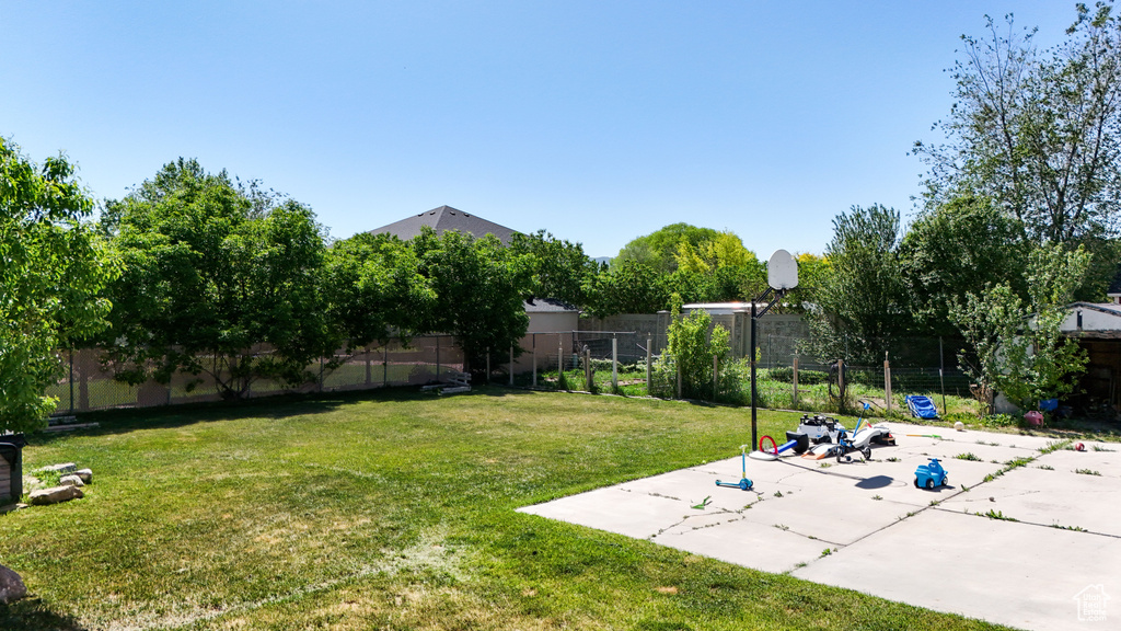 View of yard with a patio