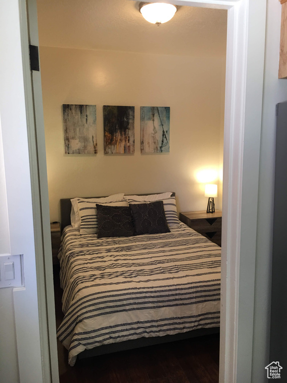 Bedroom featuring wood finished floors