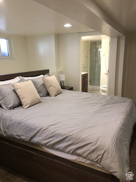 Bedroom with recessed lighting and ensuite bath
