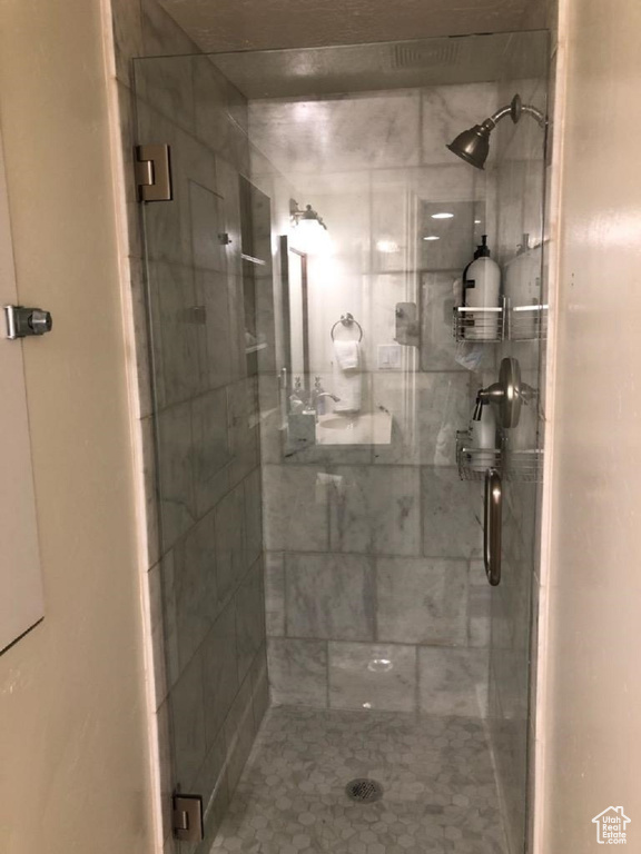 Bathroom with a stall shower