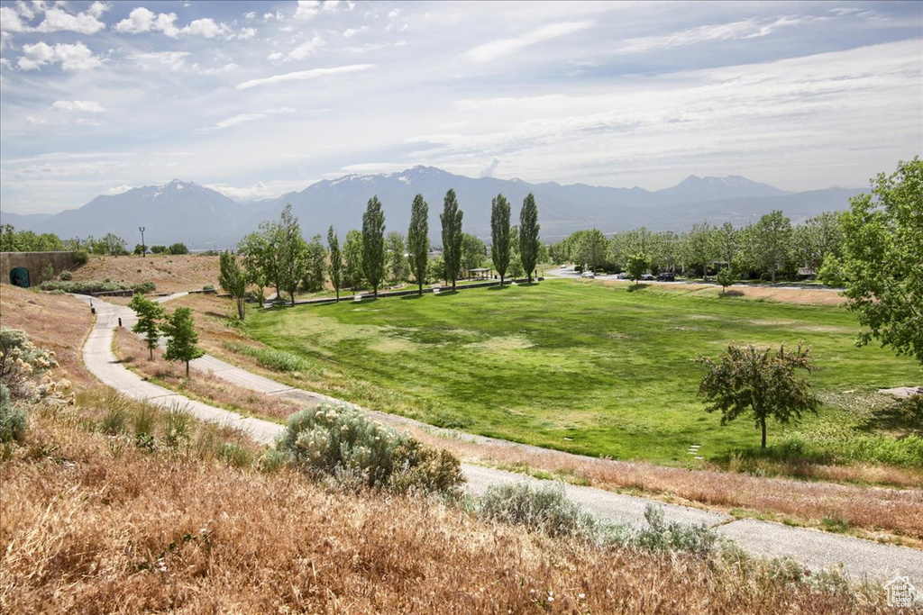 View of mountain background featuring rural landscape