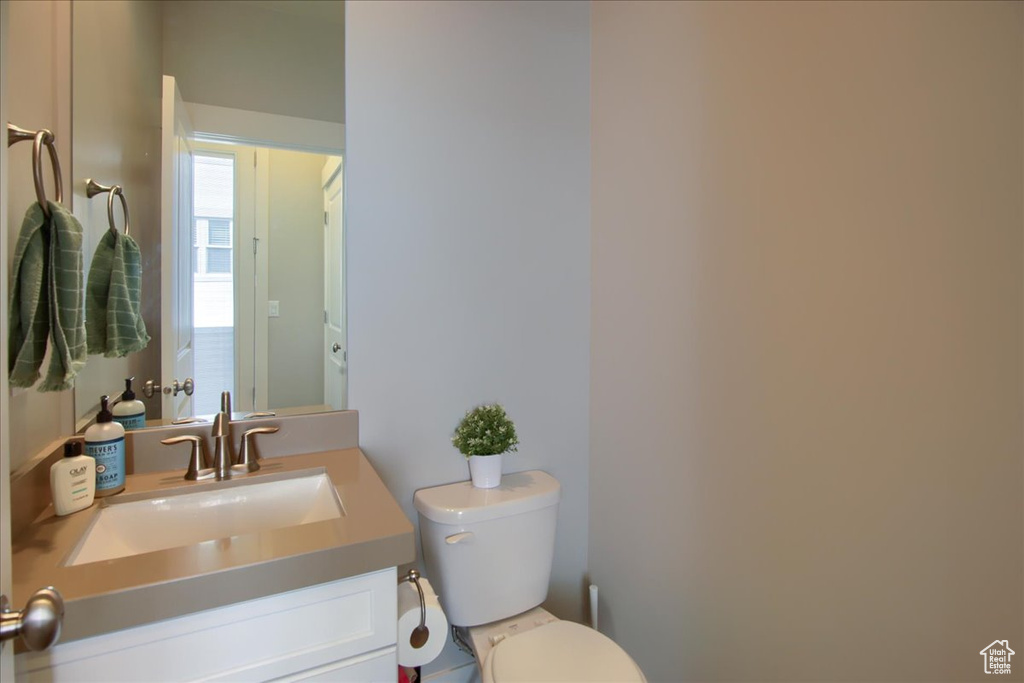 Half bath with toilet and vanity