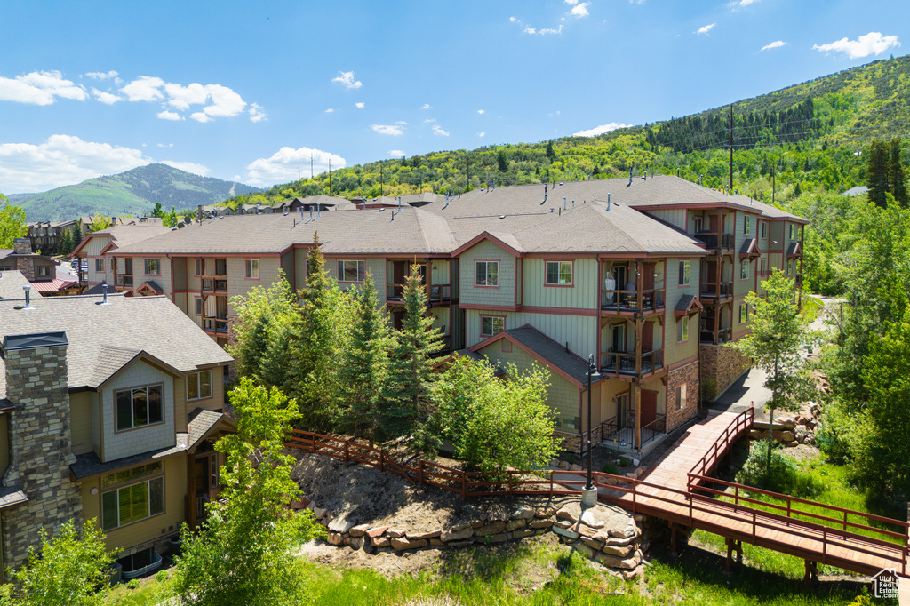 Aerial view of residential area with a mountainous background