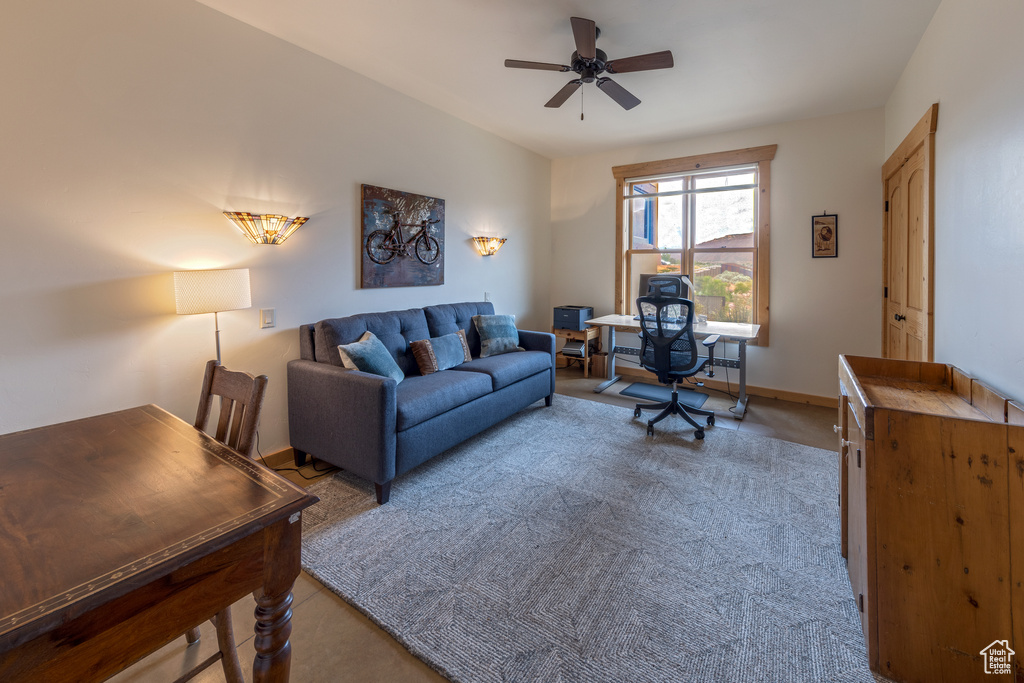 Office featuring ceiling fan, carpet flooring, and baseboards