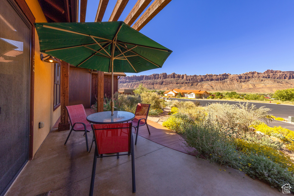 View of patio / terrace with a mountain view