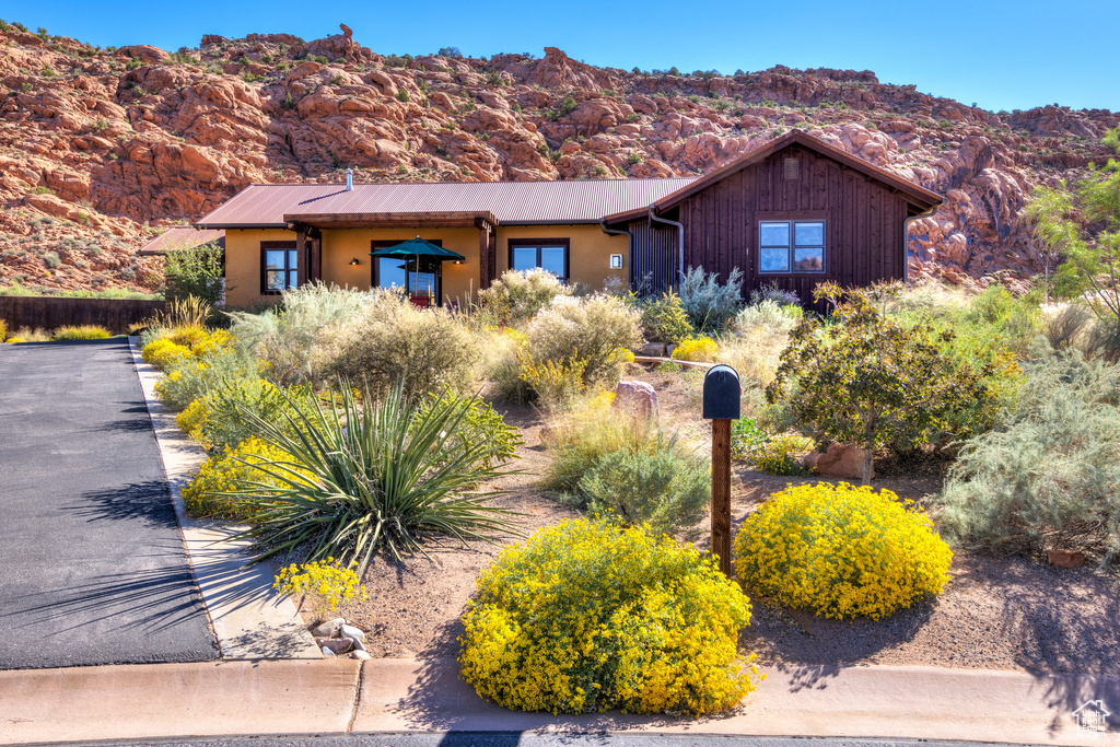 View of front of property featuring a mountain view