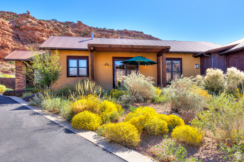 View of front of home with a mountain view