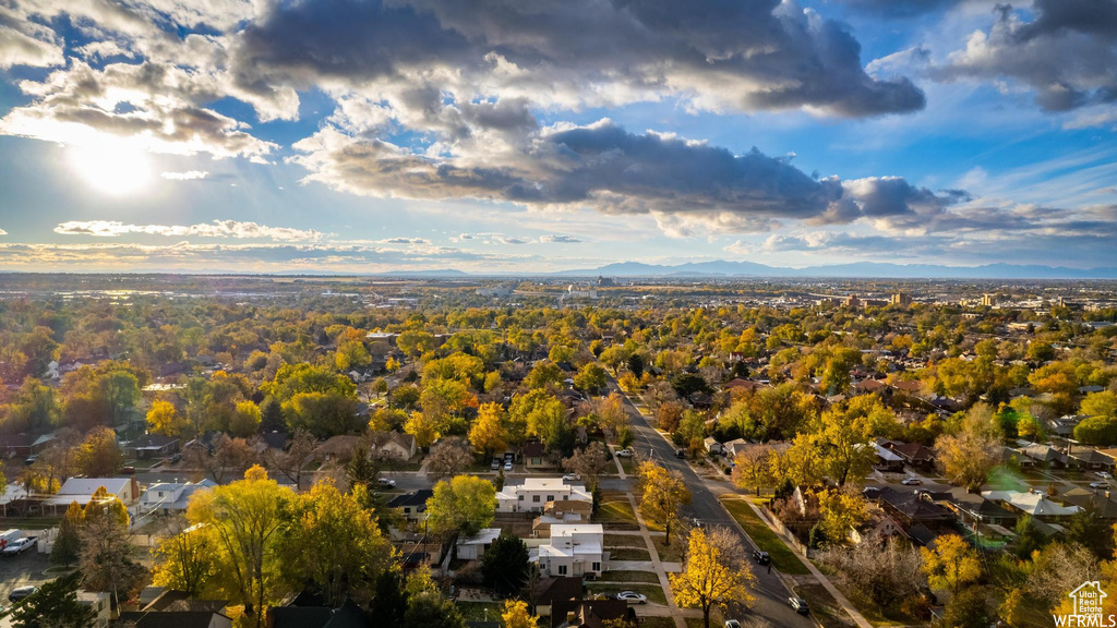 Aerial overview of property\\\'s location with mountains and nearby suburban area