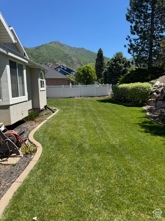 View of yard with a mountain view