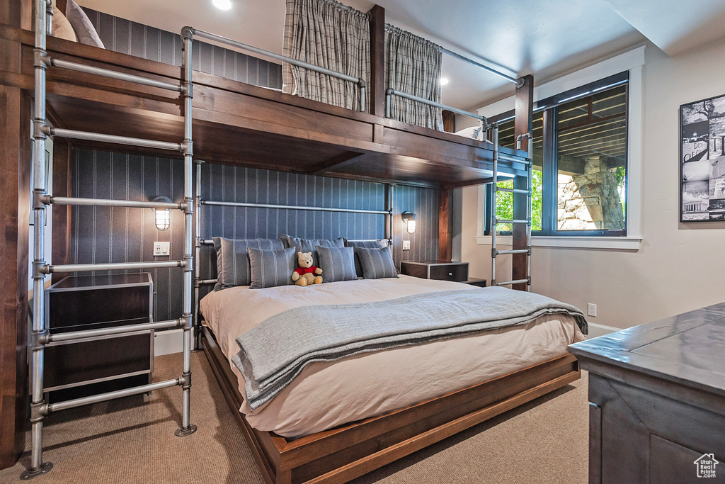 Carpeted bedroom featuring recessed lighting