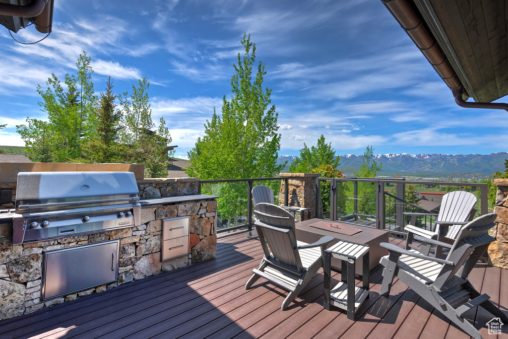 Deck featuring a mountain view