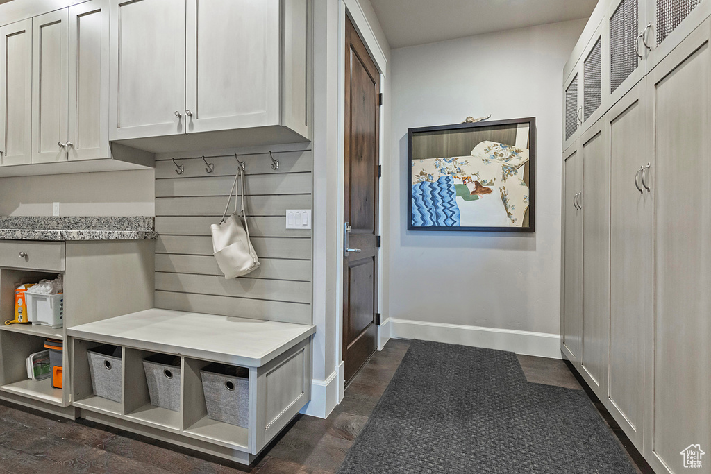 Mudroom featuring baseboards
