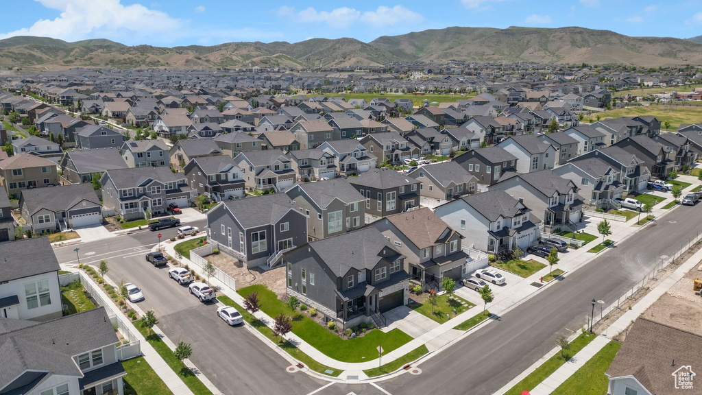 Aerial view of residential area with mountains