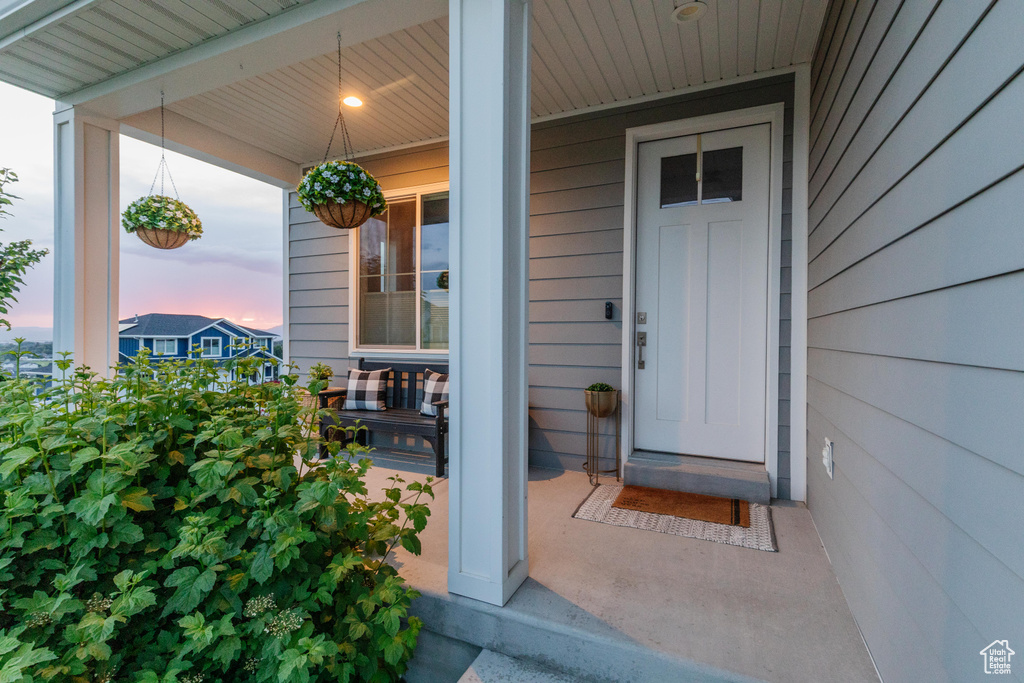 Property entrance featuring a porch