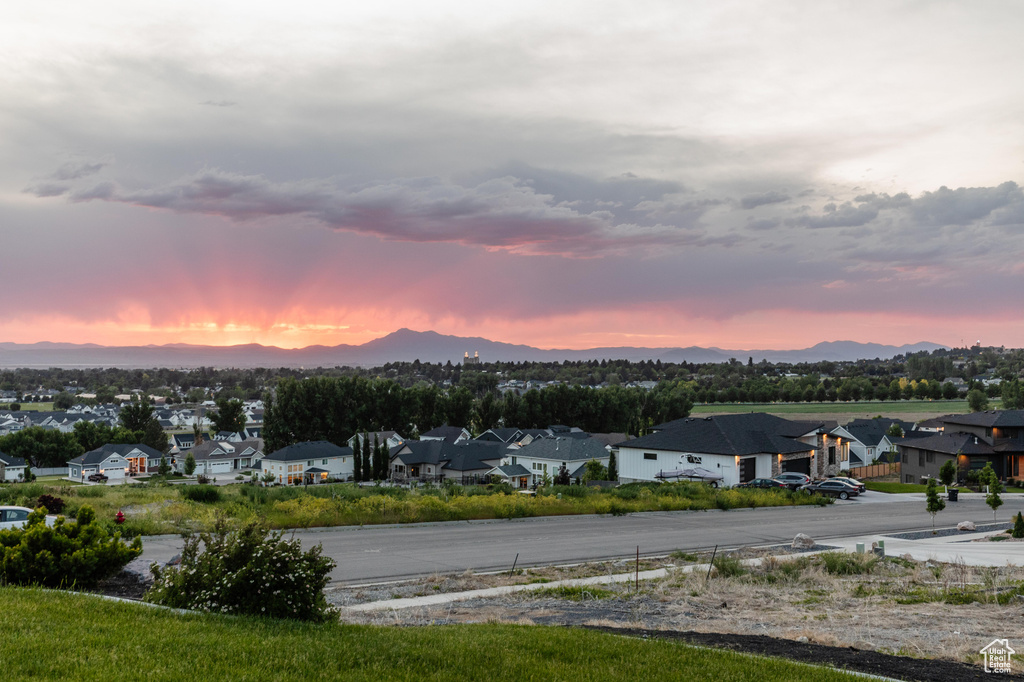 View of mountain backdrop with nearby suburban area