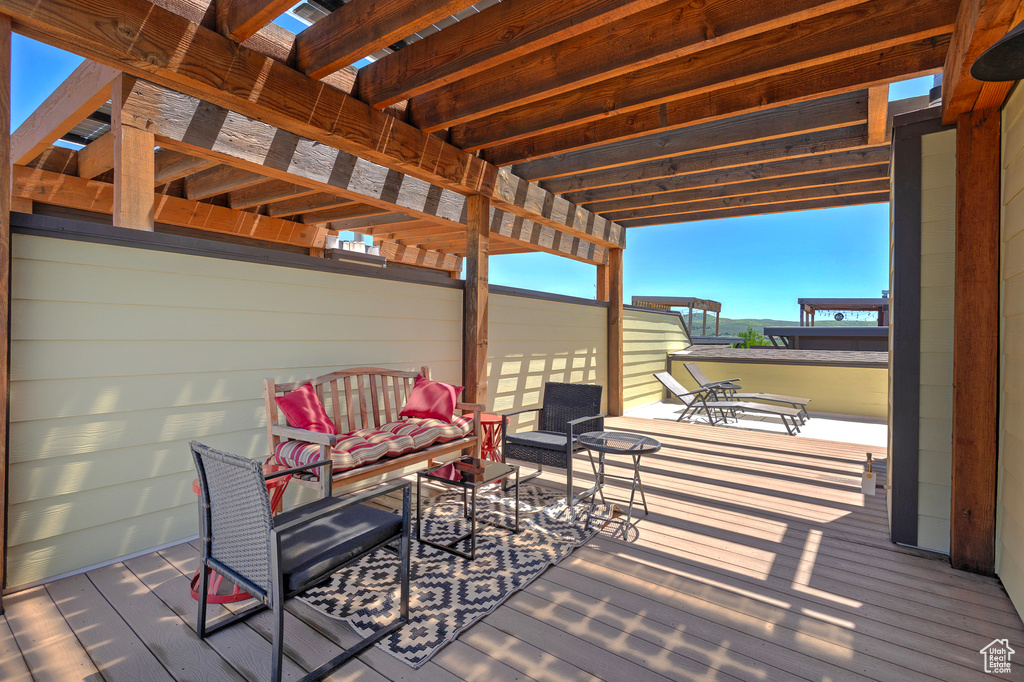 Wooden deck with a pergola