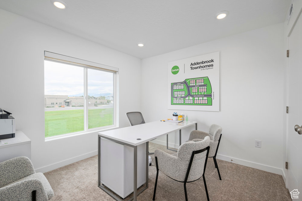 Office area with baseboards, light carpet, and recessed lighting